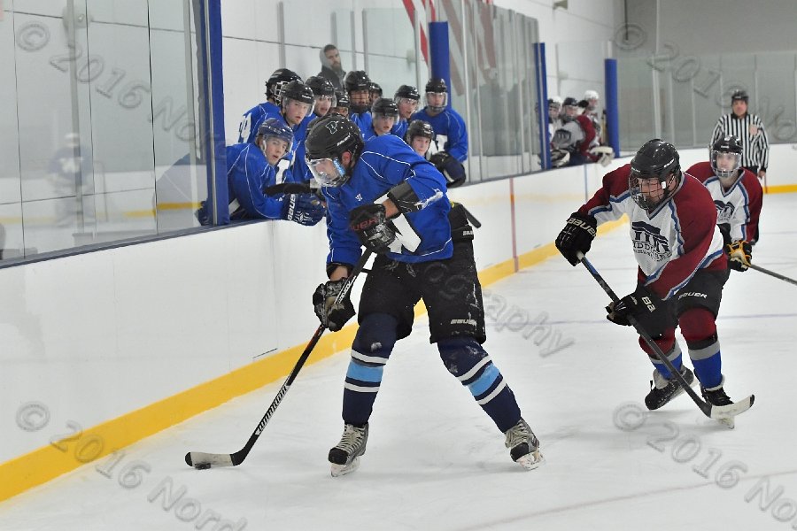 Wheaton College Men\'s Ice Hockey vs Middlesex Community College. - Photo By: KEITH NORDSTROM